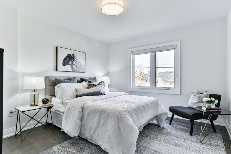 Calm grey bedroom with soft lighting